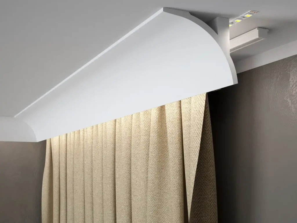 curved-white-plaster-cornice-with-led-strip-light-concealing-ceiling-mounted-curtain-track