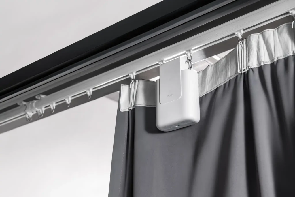 smart-motorized-curtain-controller-clipped-onto-ceiling-mounted-aluminum-track