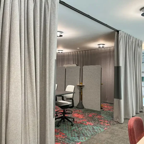 gray-floor-to-ceiling-curtains-on-black-ceiling-track-used-as-office-room-dividers